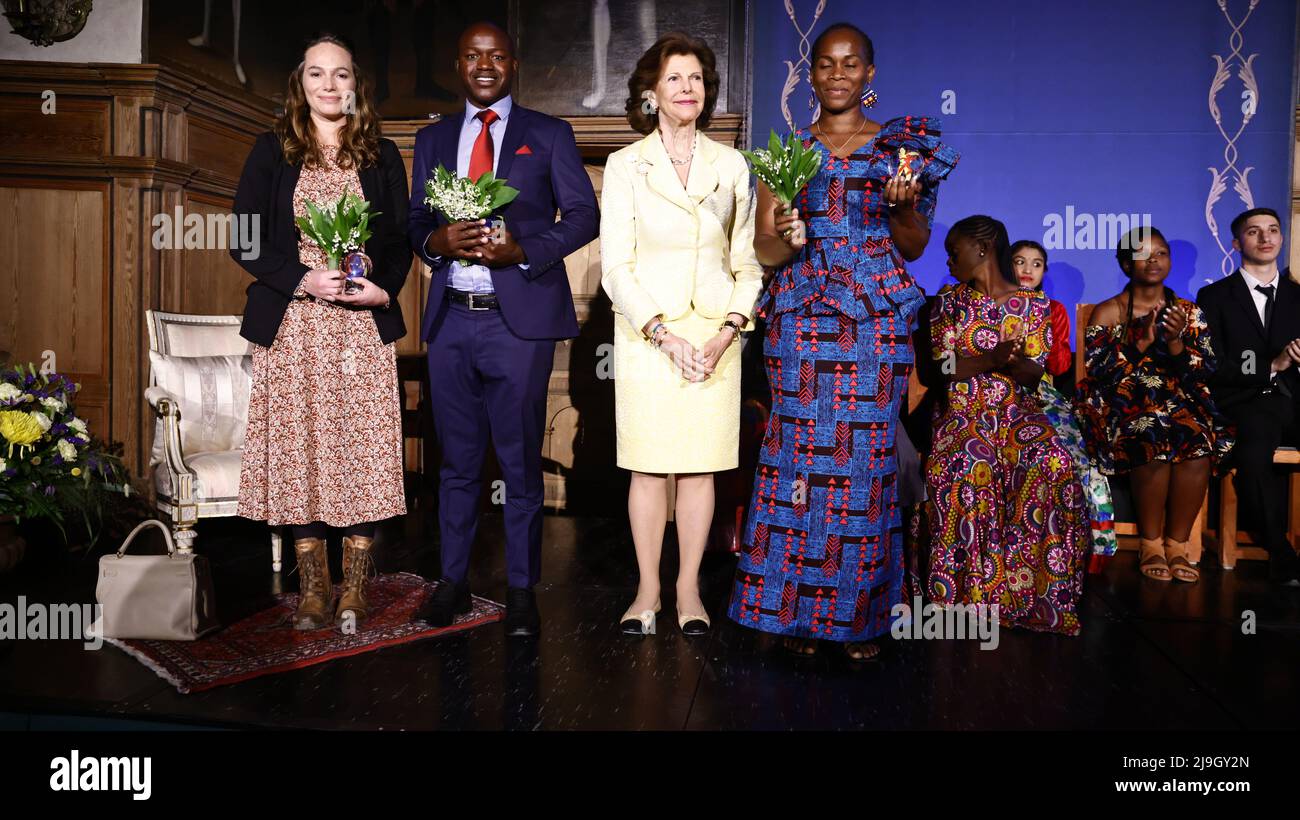 MARIEFRED 20220523 Queen Silvia awards (from L to R) Juanita Verhoef, Peace Parks Foundation, South Africa, Godknows Nyuwani, African Wildlife Conservation Fund, South Africa, and Lucrescéncia Macuacua, game preserver at Peace Parks Foundation, South Africa during the award ceremony for   World's Children's Prize at Gripsholms castle in Mariefred. Organisations Peace Park Foundation and Wildlife Conservation Fund work against wildlife crime in Sout Africa and cooperate with World’s Children's Prize to educate children on childrens rights, animal rights and climate change.   Photo: Stefan Jerre Stock Photo