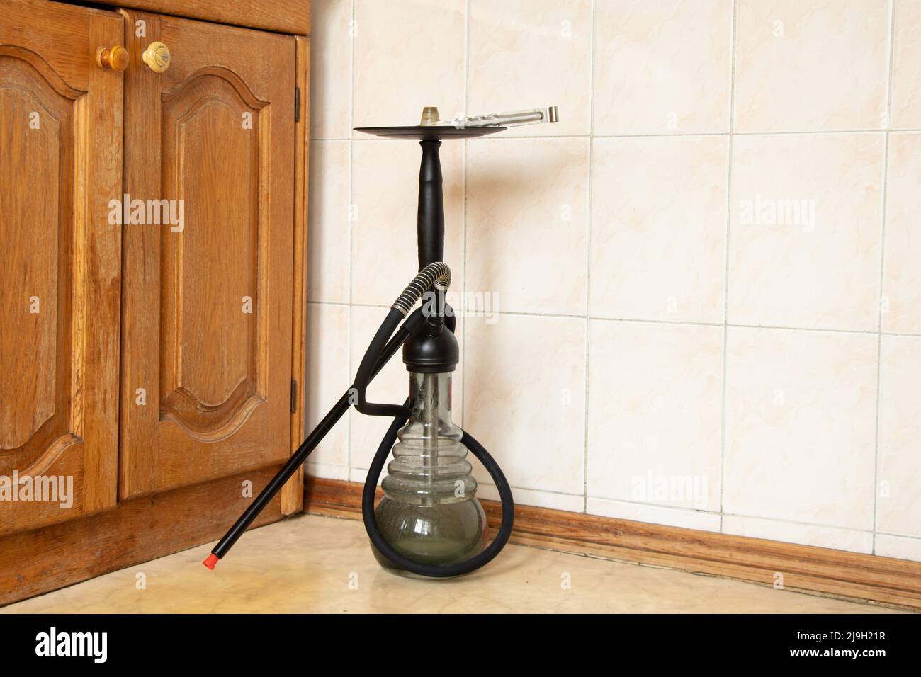 A hookah stands in the kitchen in an apartment at home, smoking a hookah Stock Photo Alamy