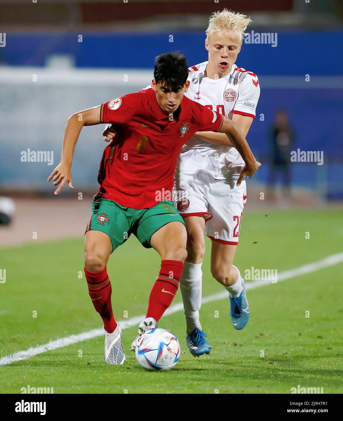 Tel Aviv, Israel. 23rd May, 2022. João Miguel Fins Veloso (8 Portugal) and Oscar O. Hojlund (20 Denmark) battle for the ball (duel) during the UEFA Under 17 European Championship 2022 football match between Portugal and Denmark at Ramat-Gan-Stadium in Tel Aviv, Israel. Alan Shiver/SPP Credit: SPP Sport Press Photo. /Alamy Live News Stock Photo