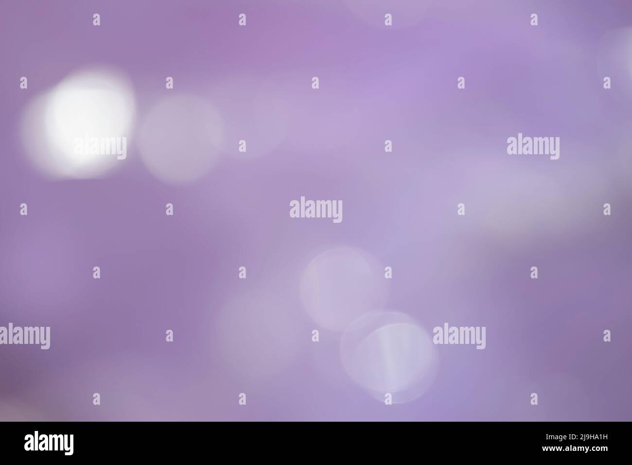 Abstract blur purple bokeh background. Defocused blurred color light ...