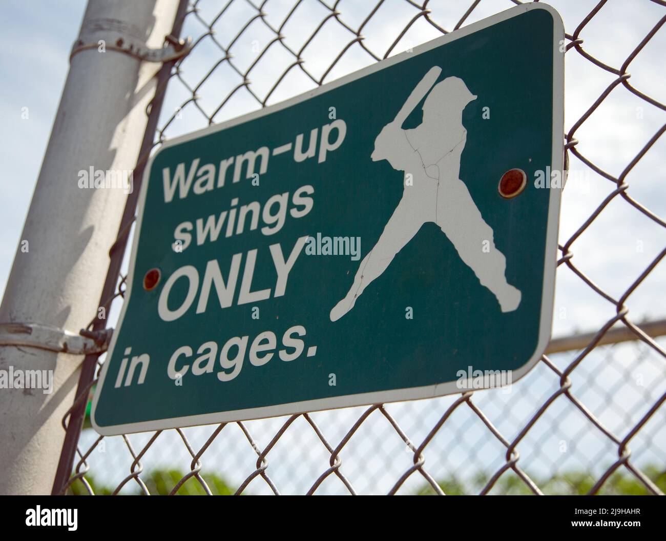 Sign at a baseball field promoting safety Stock Photo