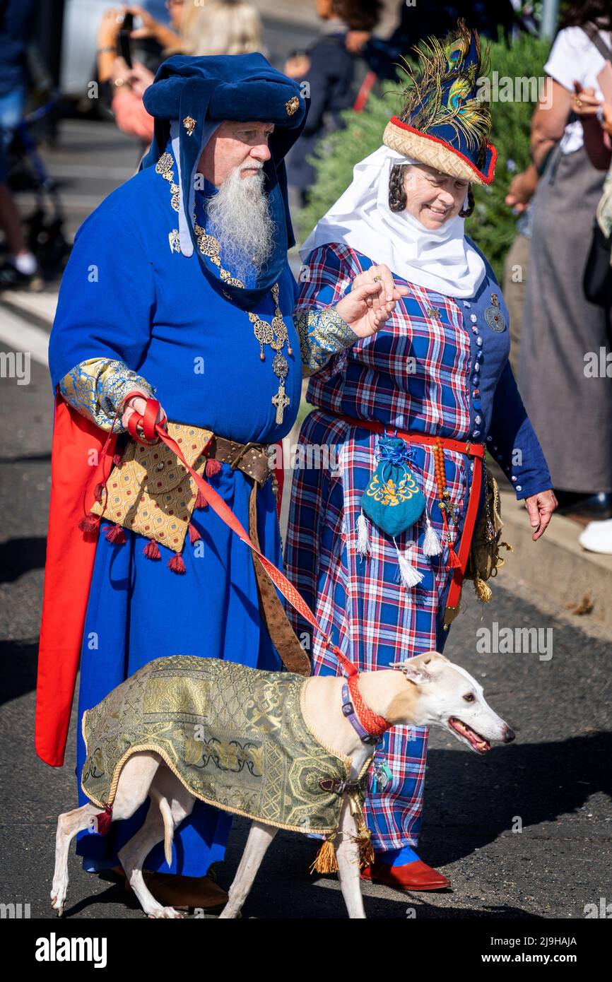Couple in traditional dress take part in street parade at opening of Glen Innes Celtic Festival, NSW Australia Stock Photo