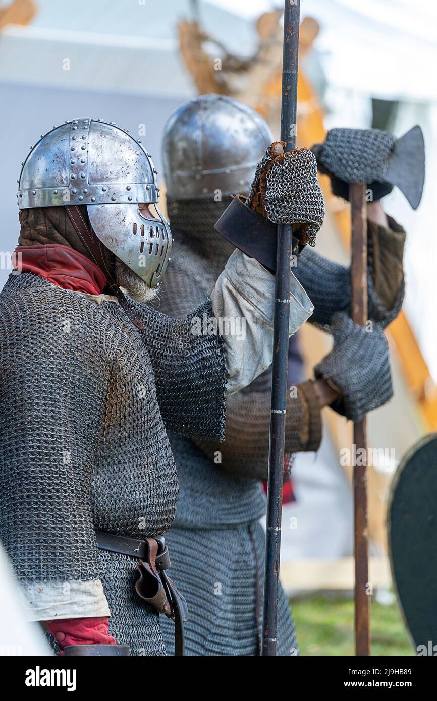 Warriors in chain mail undertake medieval combat at historical re-enactment tournament. Glen Innes Celtic Festival, New South Wales Australia Stock Photo