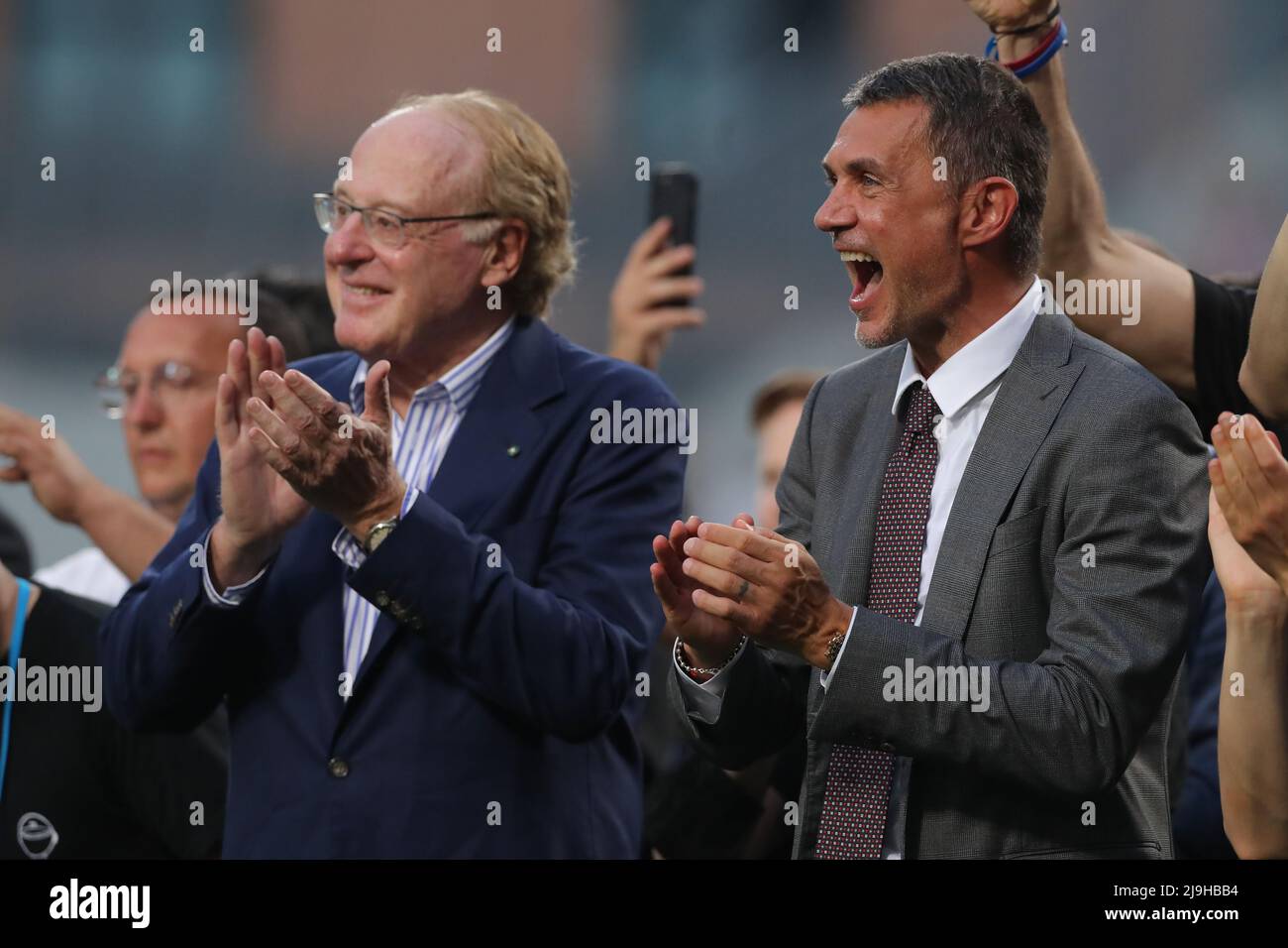 Sassuolo, Italy, 22nd May 2022. Paolo Scaroni President of AC Milan and Paolo Maldini AC Milan First Team Technical Director applaud as players make their way to the winners' podium for the trophy presentation following the Serie A match at Mapei Stadium - Cittˆ del Tricolore, Sassuolo. Picture credit should read: Jonathan Moscrop / Sportimage Stock Photo