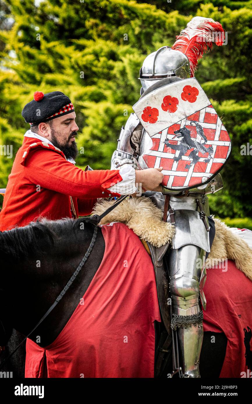 Knights in armour on horseback during jousting tournament demonstration at Glen Innes Celtic Festival. New South Wales, Australia Stock Photo