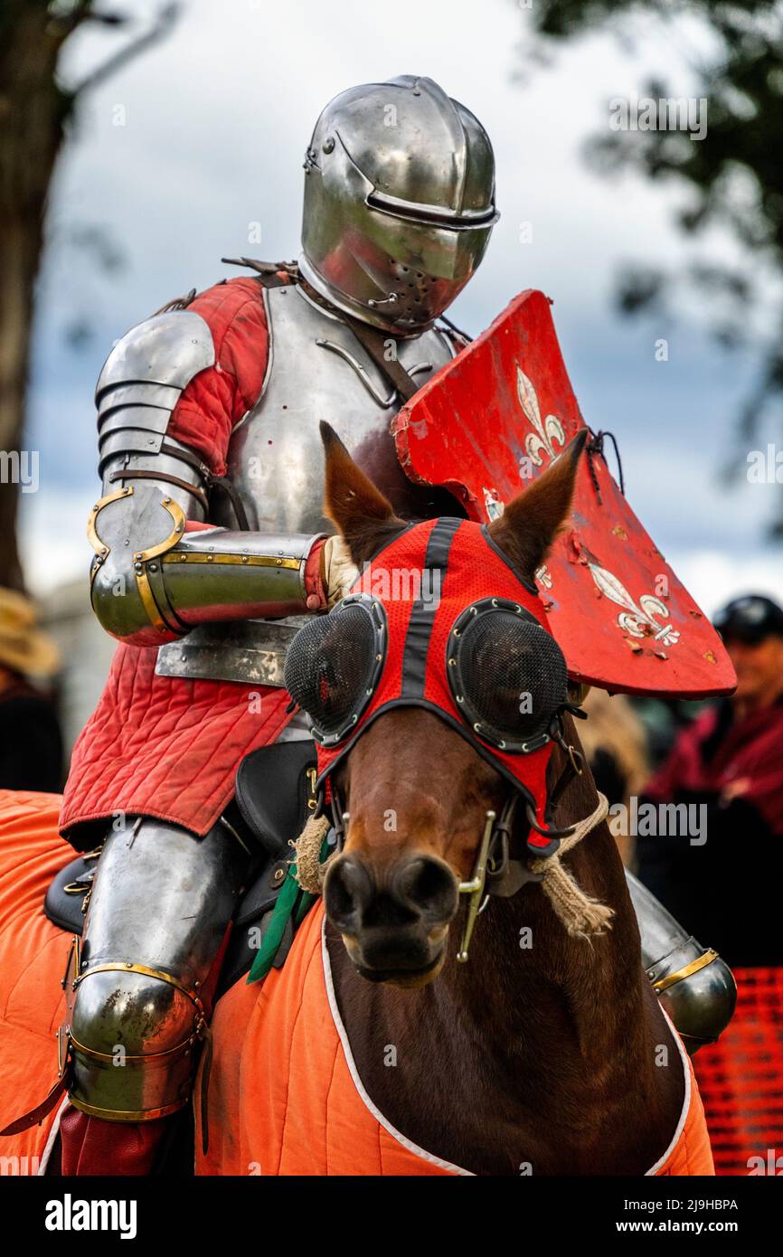 Knights in armour on horseback during jousting tournament demonstration at Glen Innes Celtic Festival. New South Wales, Australia Stock Photo