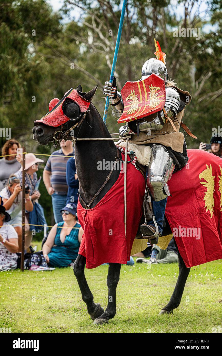 Knights on horseback during jousting tournament demonstration at Glen Innes Celtic Festival. New South Wales, Australia Stock Photo