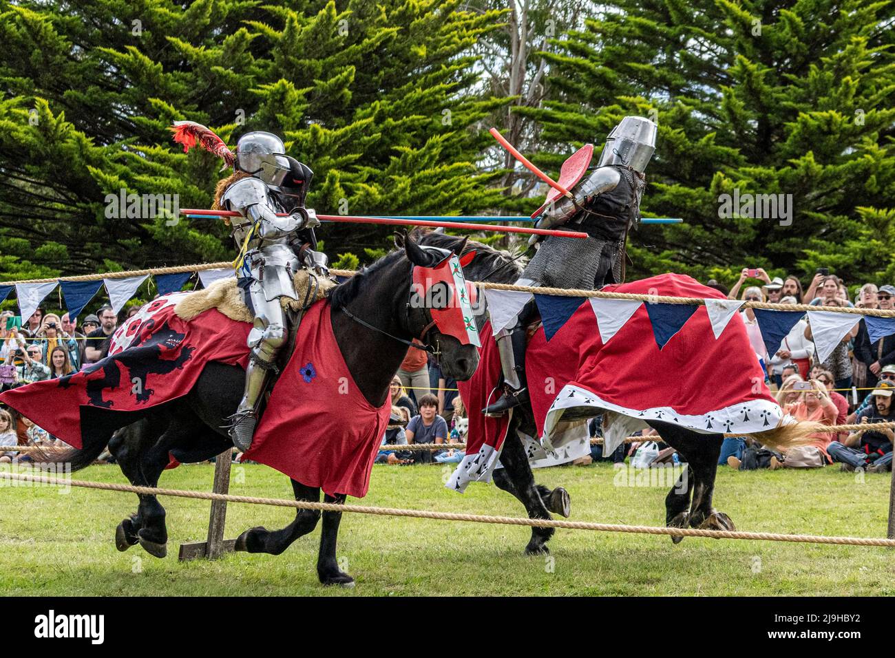 Knights on horseback during jousting tournament demonstration at Glen Innes Celtic Festival. New South Wales, Australia Stock Photo