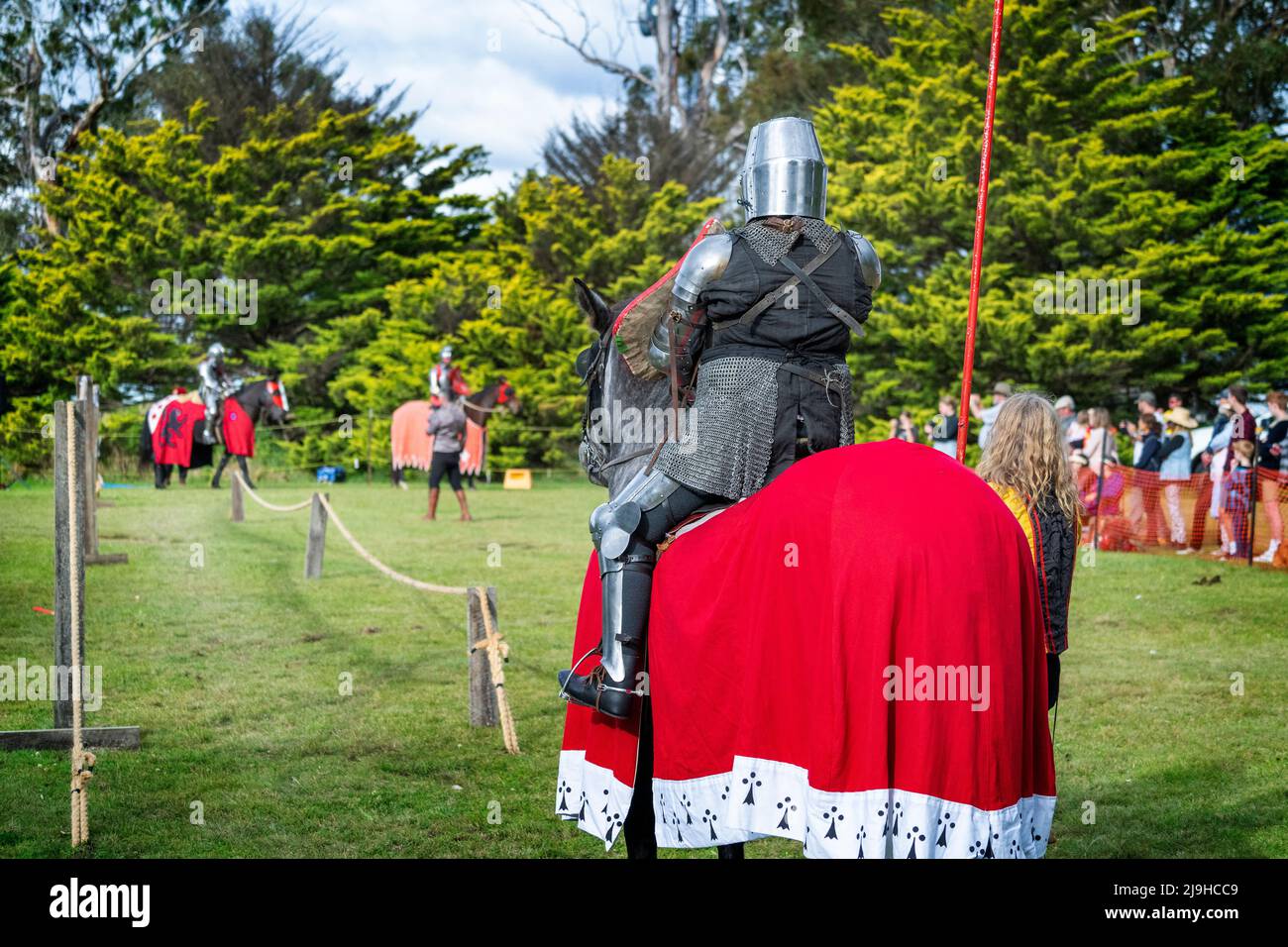 Knights on horseback during jousting tournament demonstration at Glen Innes Celtic Festival. New South Wales, Australia Stock Photo