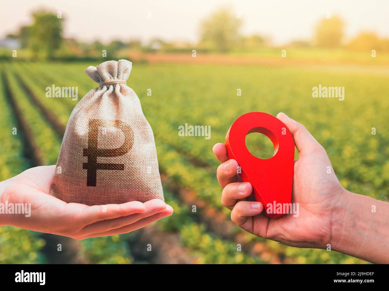 Hands with location pin and russian ruble money bag. Estimation cost of