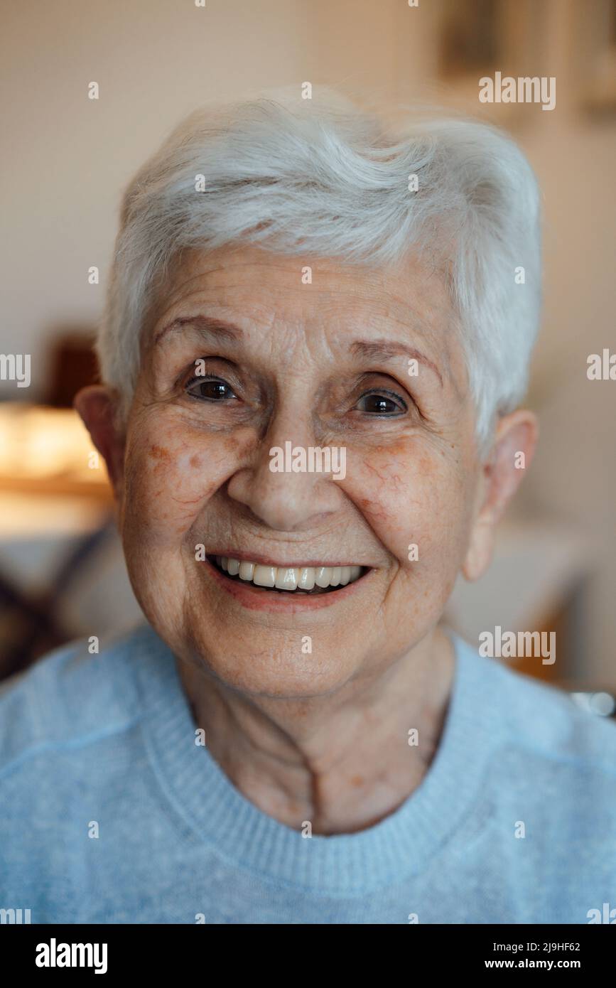 Happy senior woman with white hair Stock Photo