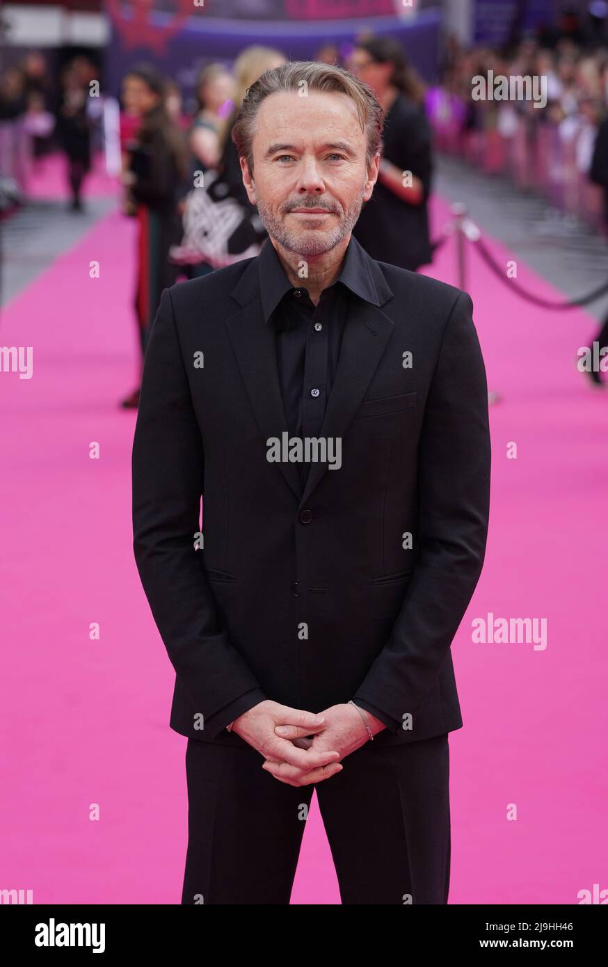Craig Pearce arriving for the premiere of Pistol, at the Odeon Luxe ...