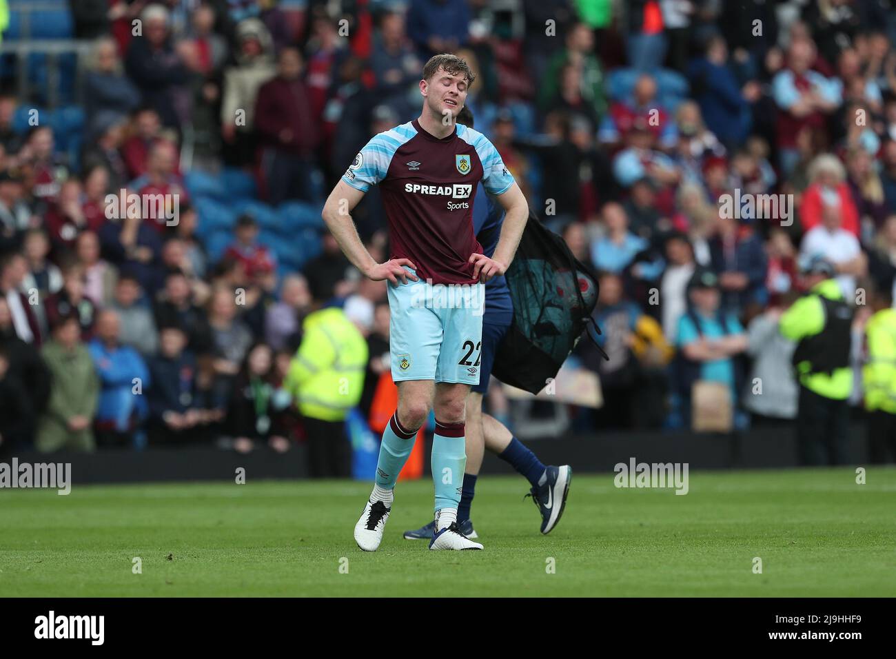 BURNLEY, UK. MAY 22ND Nathan Collins of Burnley in tears after their defeat and relegation during the Premier League match between Burnley and Newcastle United at Turf Moor, Burnley on Sunday 22nd May 2022. (Credit: Mark Fletcher | MI News) Credit: MI News & Sport /Alamy Live News Stock Photo