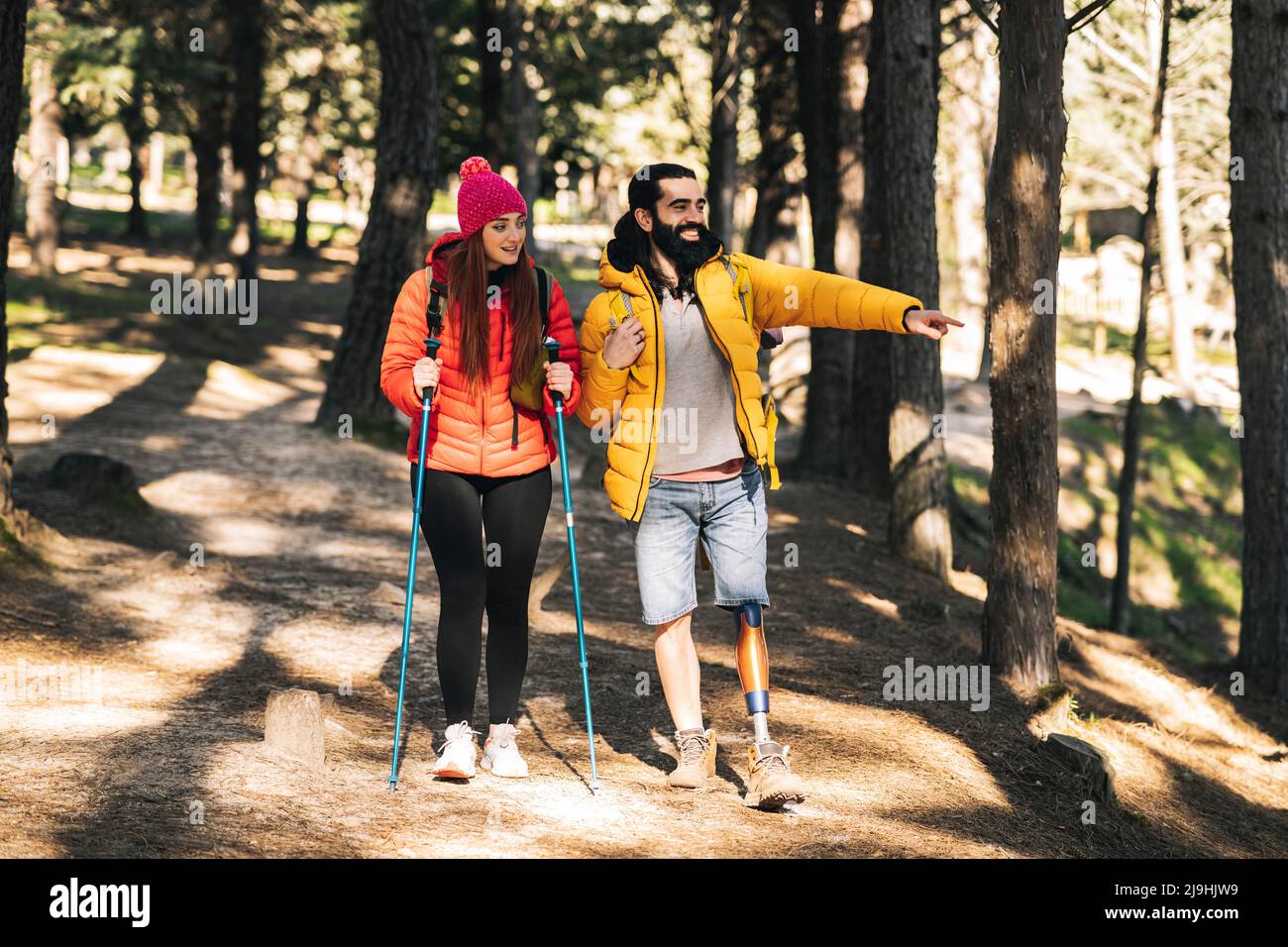 Man woman female couple walking hiking hi-res stock photography and ...