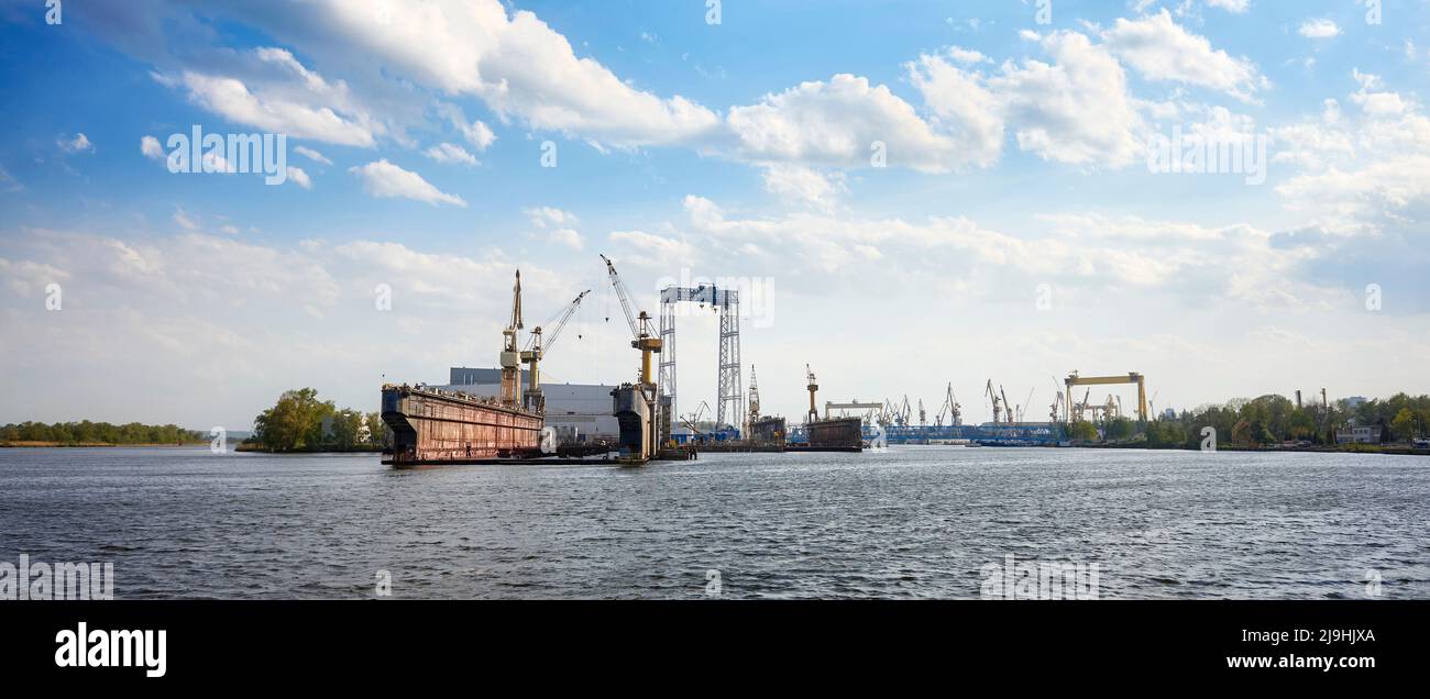 Empty dry dock seen from the water in Szczecin, Poland Stock Photo