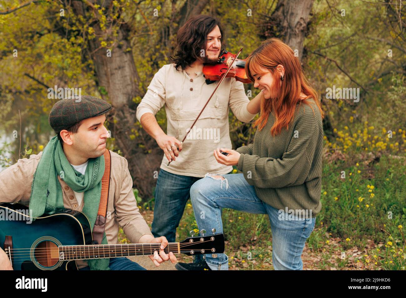 Folk music group with musical instruments at roadside Stock Photo Alamy