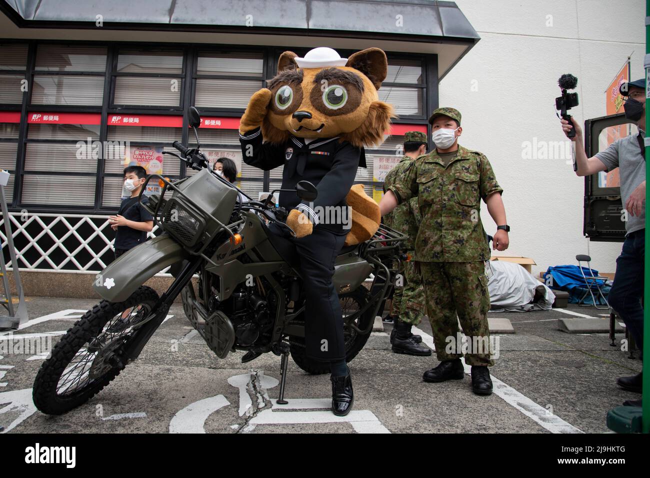 Shimoda, Japan. 22nd May, 2022. Yoko-pon, the official mascot of Commander, U.S. Navy Fleet Activities Yokosuka, poses on a motorcycle during the 83rd annual Shimoda Black Ship festival May 22, 2022 in Shimoda, Japan. The Shimoda Black Ship festival, or Shimoda Kurofune, celebrates the arrival of Commodore Matthew Perry and the opening of Japan to the outside world. Credit: MC1 Kaleb J. Sarten/U.S. Air Force/Alamy Live News Stock Photo
