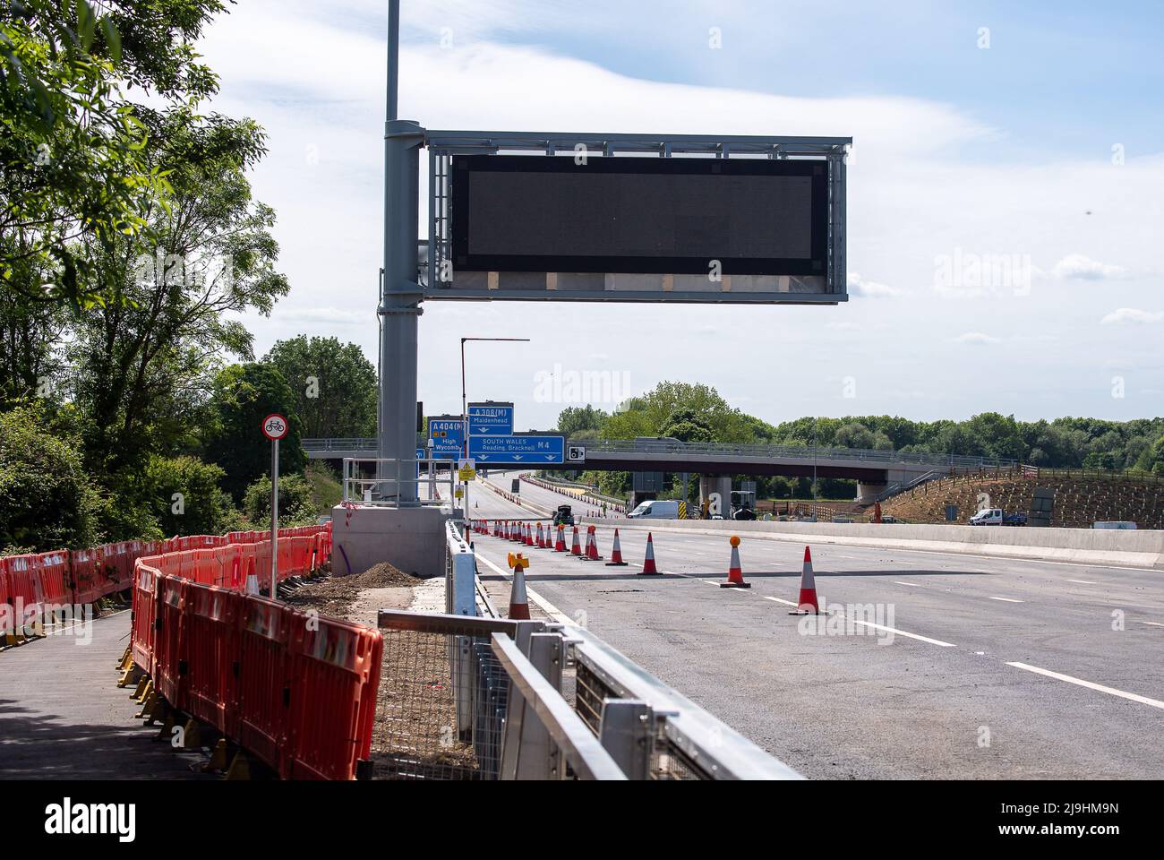 Dorney Reach, UK. 23rd May, 2022. The M4 was closed again this weekend between Junction 6 (Slough/Windsor) and Junction 8/9 (Maidenhead) for ongoing construction works on the controversial M4 Smart Motorway upgrade. Although the M4 hard shoulder has now been removed on parts of the M4, the yellow Emergency Refuge Areas on this Berkshire stretch of M4 are not currently operational and the SOS Emergency Telephones are not live. Credit: Maureen McLean/Alamy Live News Stock Photo