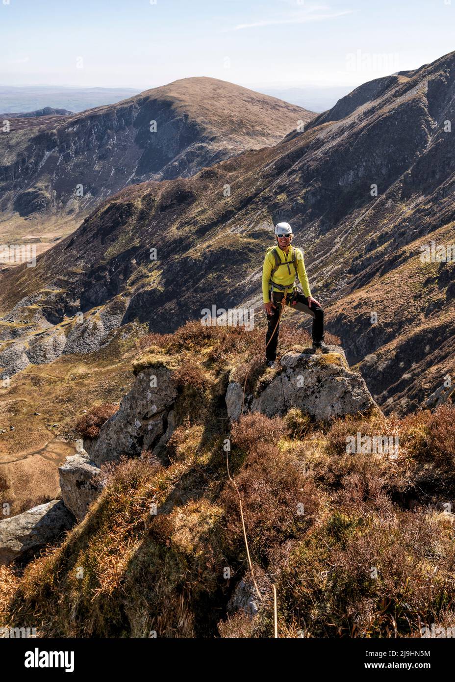 Female standing cliff top hi-res stock photography and images - Alamy
