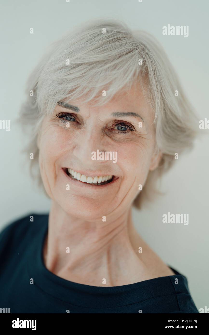 Vertical shot senior woman hi-res stock photography and images - Alamy