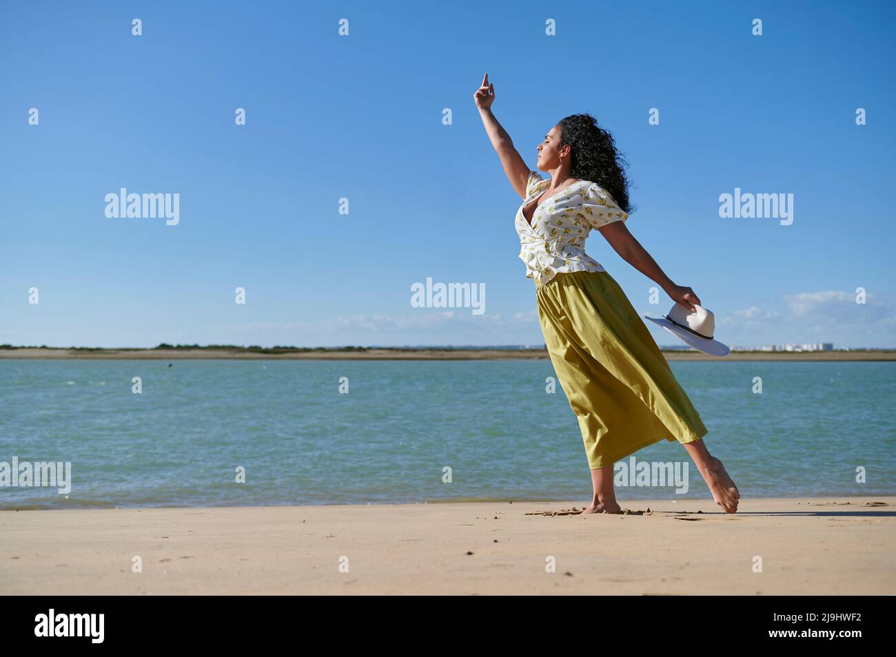 Woman dancing barefoot on sand hi-res stock photography and images - Alamy