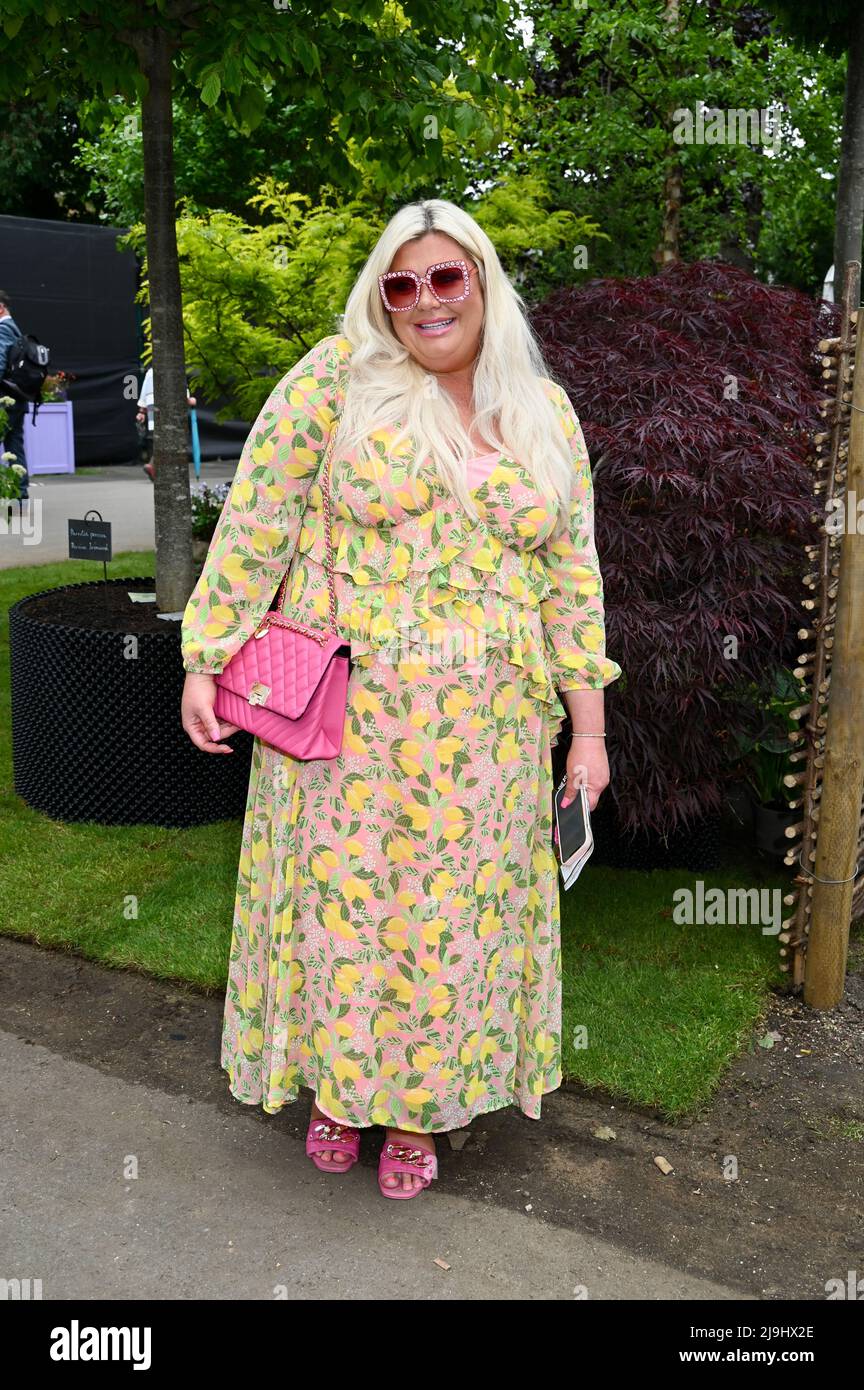 London, UK. Gemma Collins Great British Garden Festival Ambassor visited the Great British Garden Festival stand to receive her Ambassador medal. She wore a pink chiffon frill midi dress with chain decor open toe mules. RHS Chelsea Flower Show, Royal Hospital, Chelsea. Stock Photo
