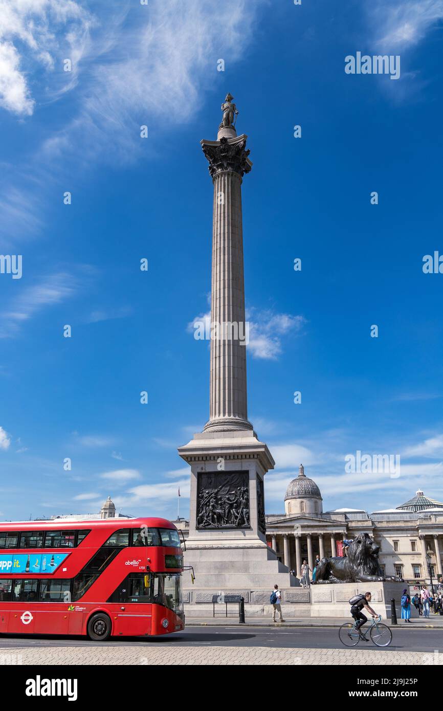 London, England - May 13, 2022: Nelson's Column at Trafalgar Square and double-decker bus, London, Great Britain Stock Photo