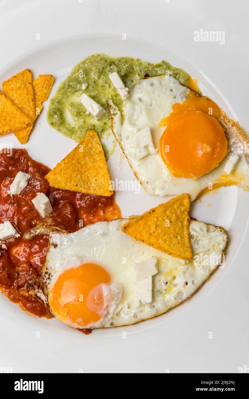 mexican fried eggs with salsa Stock Photo