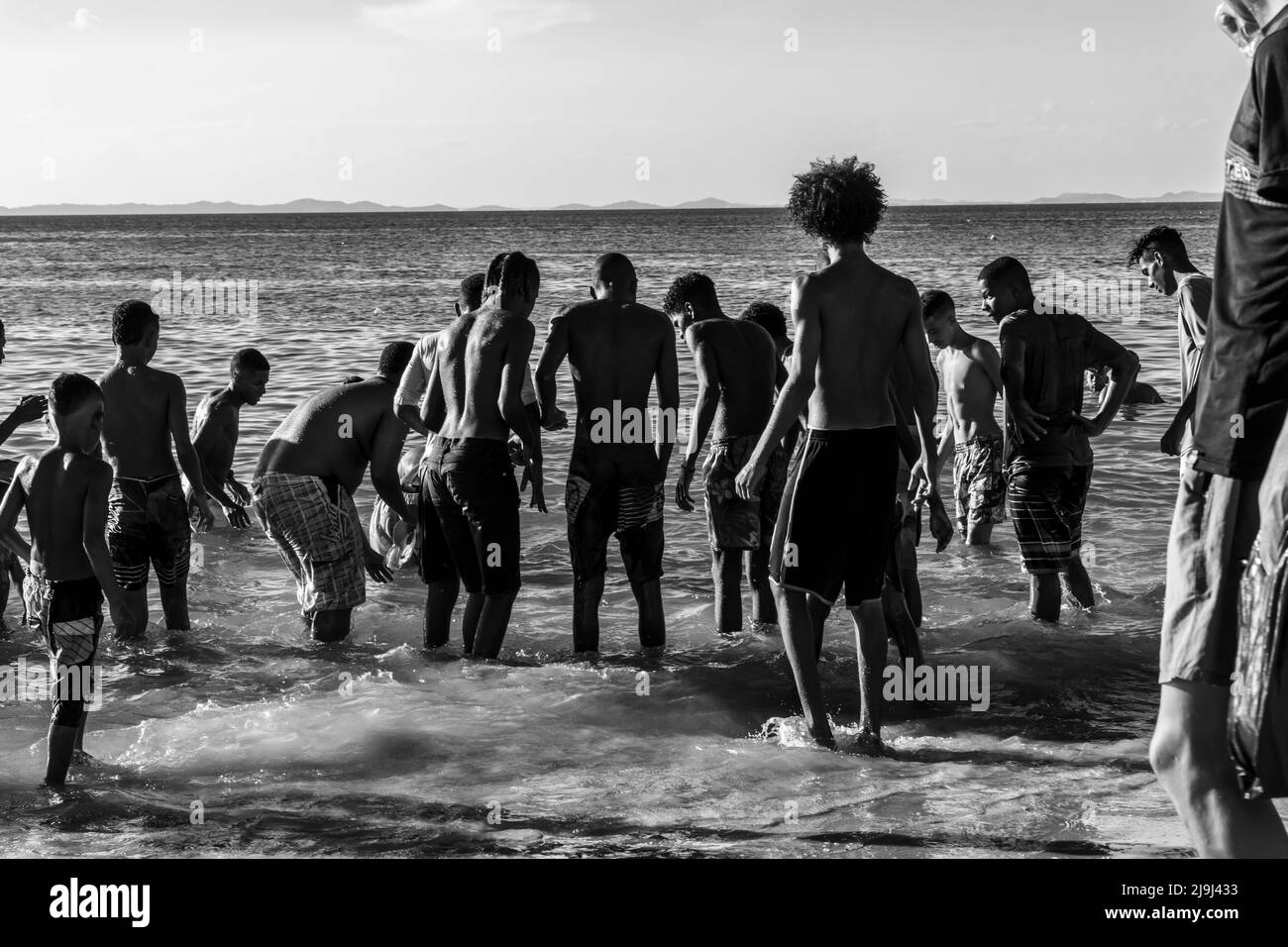 People at Ribeira beach in Salvador Bahia, having fun in the water. Stock Photo