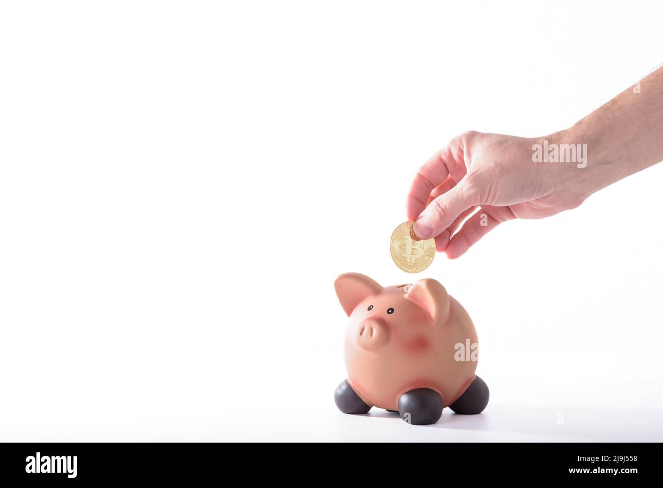 Piggy bank full of money. Coins and dollar bills. A symbol of accumulation and well-being. Purchase planning. Financial literacy. Stock Photo