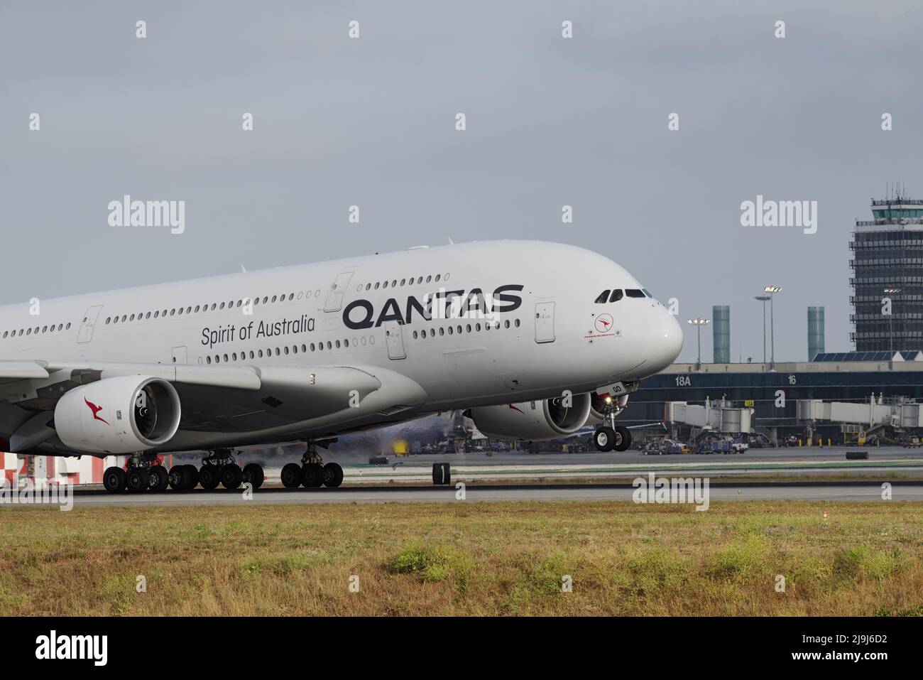 Image of Qantas Airbus A380-842 with registration VH-OQD shown touching down at Los Angeles International Airport, LAX. Stock Photo