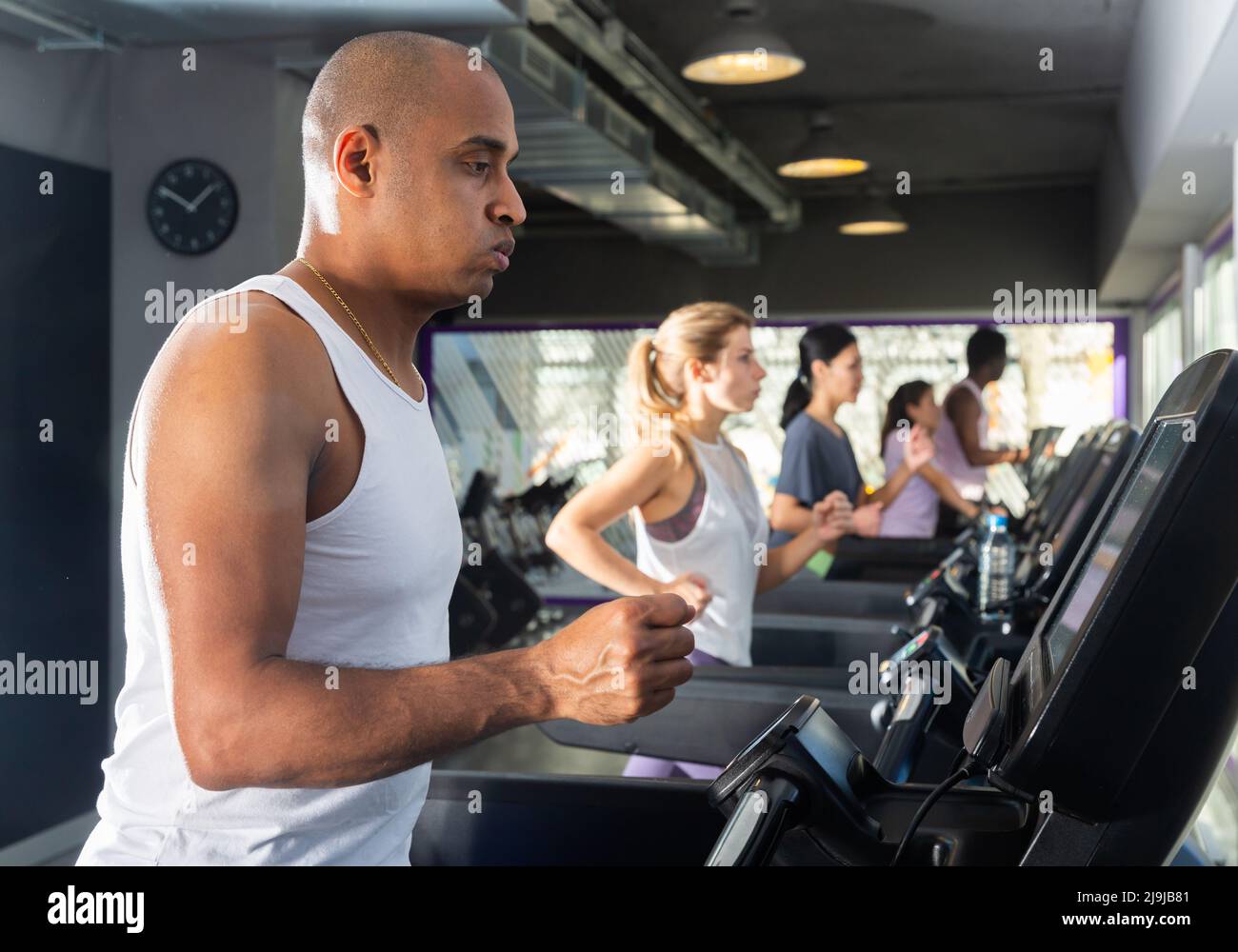 Man Running On A Treadmill In Sports Club Stock Photo Alamy man-running-on-a-treadmill-in-sports-club-stock-photo-alamy