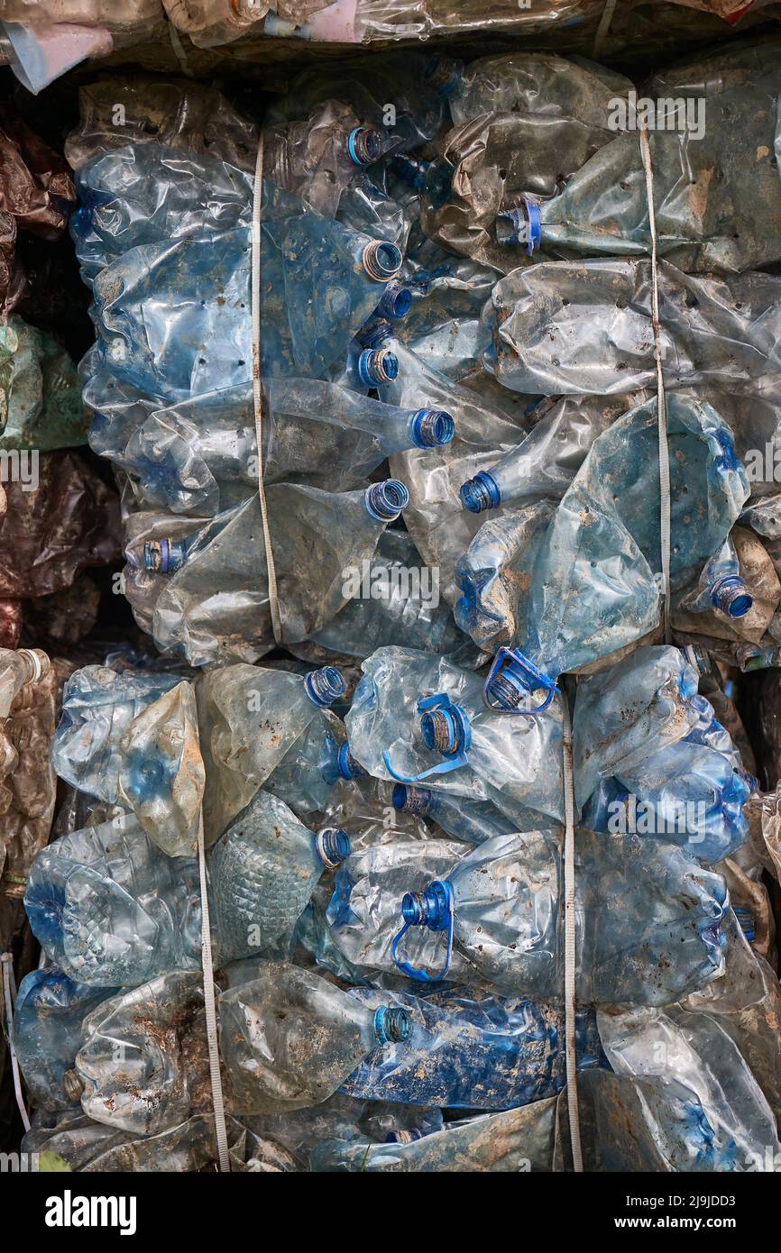 Plastic bottles in bales for waste recycling Stock Photo