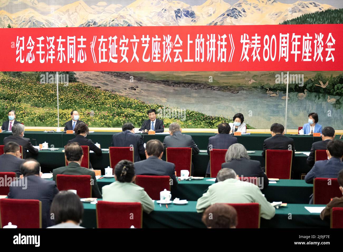 Beijing, China. 23rd May, 2022. Wang Huning, a member of the Standing Committee of the Political Bureau of the Communist Party of China (CPC) Central Committee and a member of the Secretariat of the CPC Central Committee, speaks at a meeting commemorating a celebrated speech on literature and art delivered by late Chinese leader Mao Zedong at the revolutionary base of Yan'an 80 years ago, in Beijing, capital of China, May 23, 2022. Credit: Yan Yan/Xinhua/Alamy Live News Stock Photo