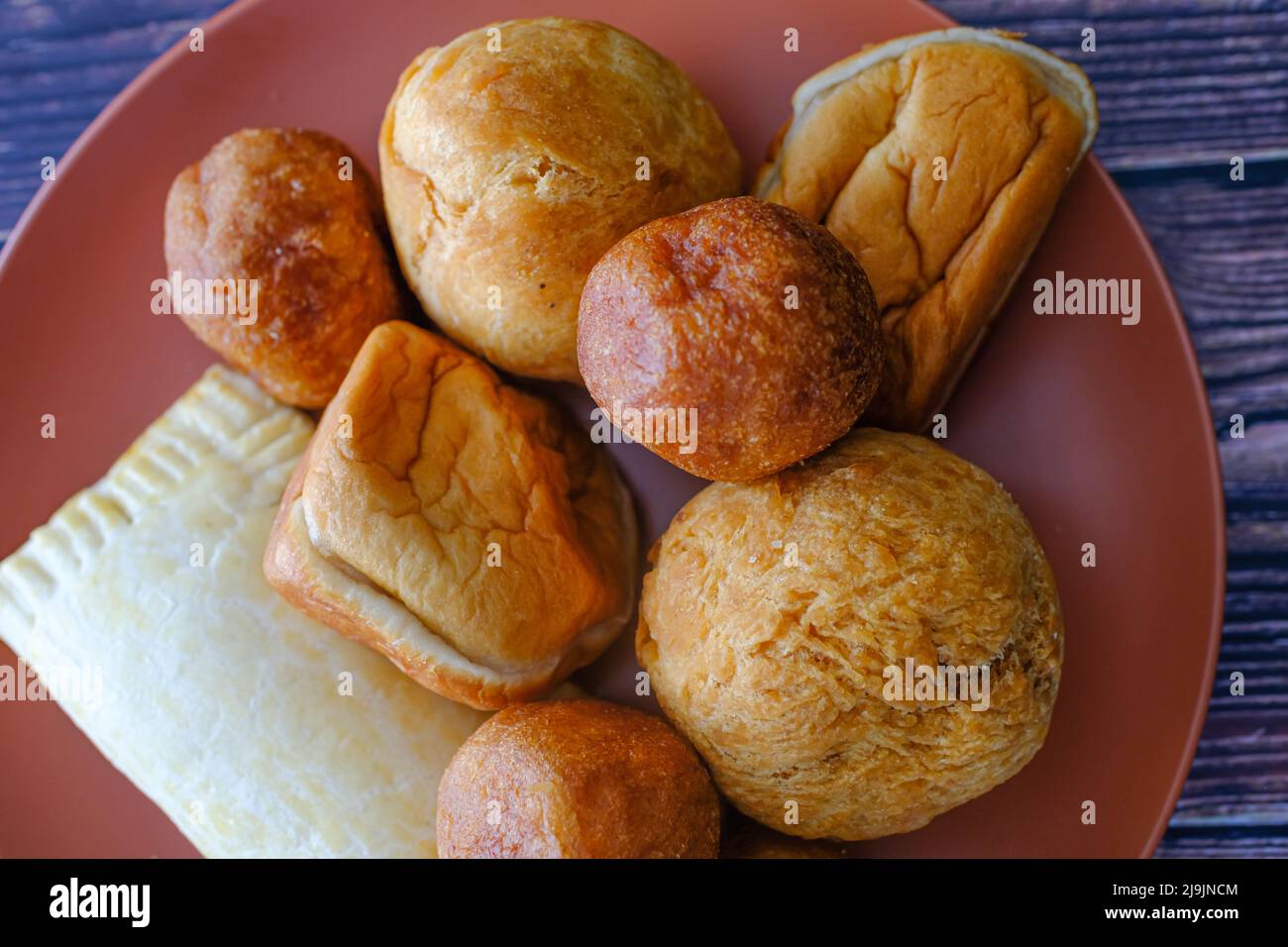 Nigerian Snacks Meat Pie, Puff Puff , buns and Egg roll Stock Photo Alamy