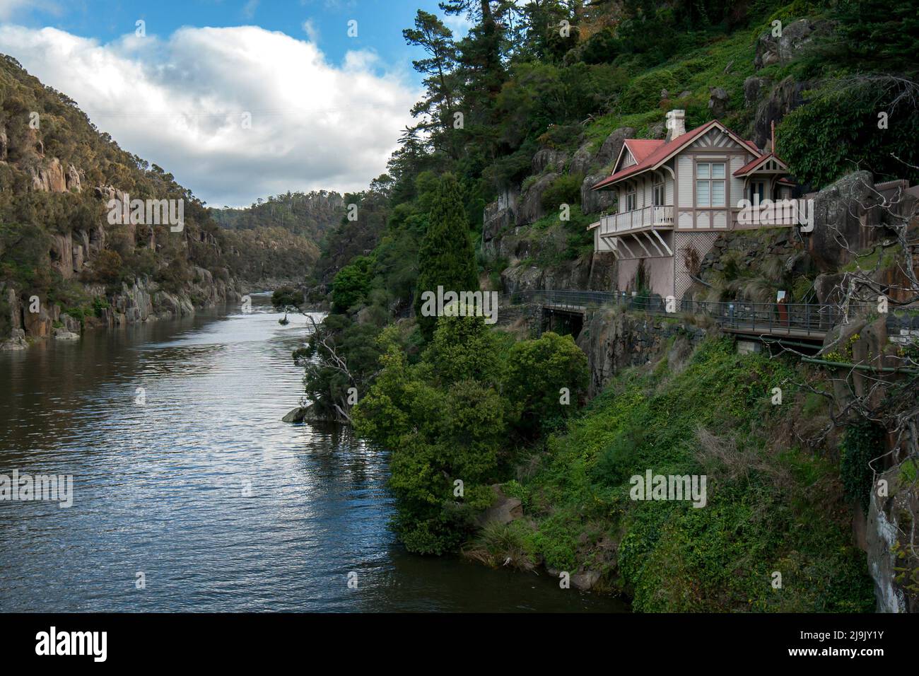 The South Esk River flowing through the Cataract Gorge at Launceston in Tasmania, Australia. On the left stands King's Bridge Cottage. Stock Photo