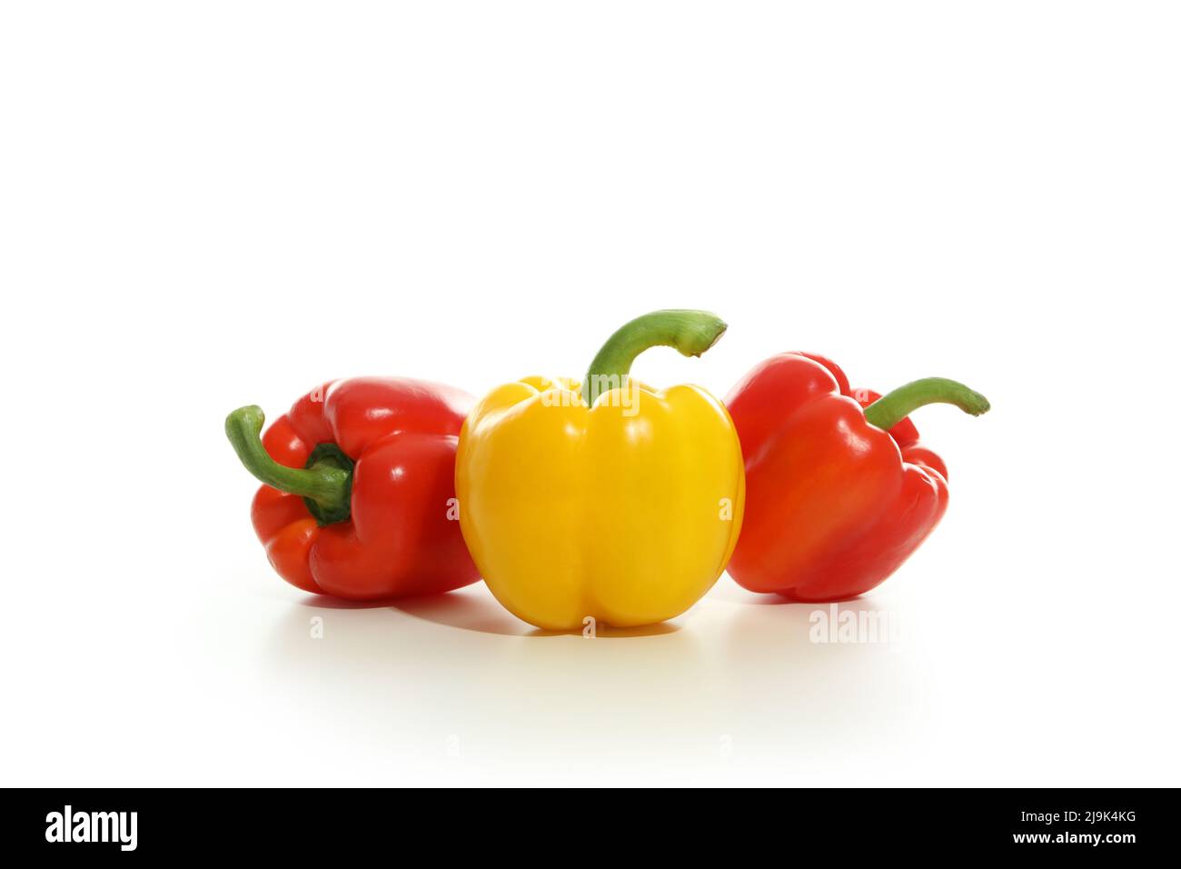 Three bell peppers isolated on white background Stock Photo - Alamy