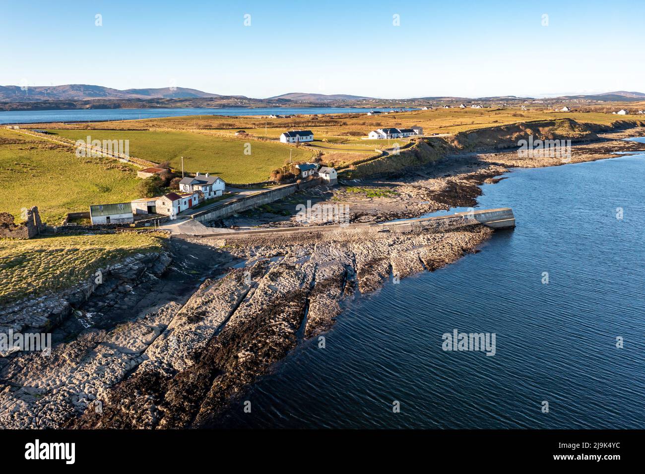 Aerial view of the Ballysaggart pier and the 15th century Franciscan Third Order remains at St