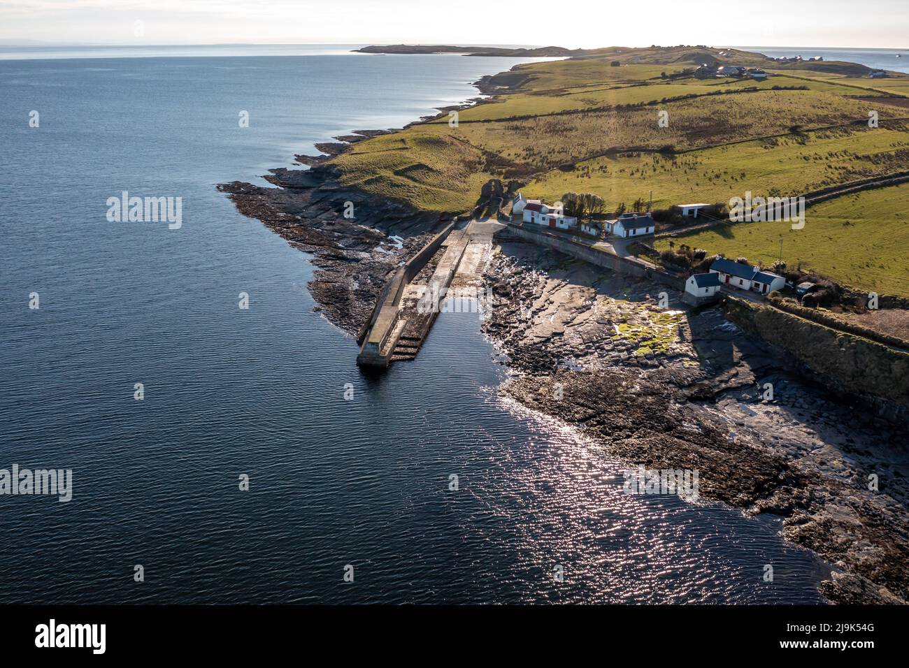 Aerial view of the Ballysaggart pier and the 15th century Franciscan Third Order remains at St
