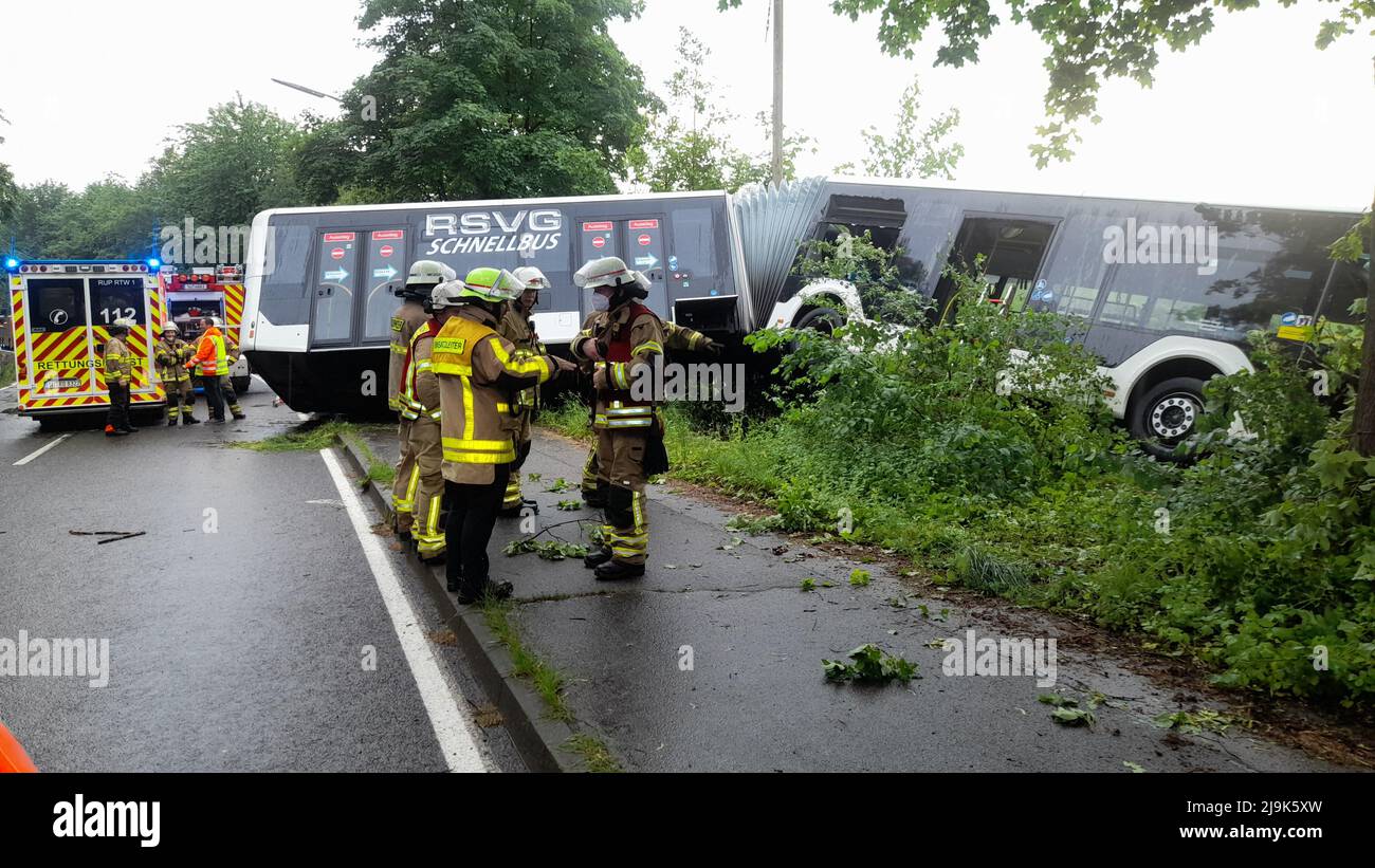 Much, Germany. 23rd May, 2022. Emergency services secure the scene of the accident. A bus in the Rhein-Sieg district left the road and crashed into a tree. Credit: Marius Fuhrmann/dpa/Alamy Live News Stock Photo
