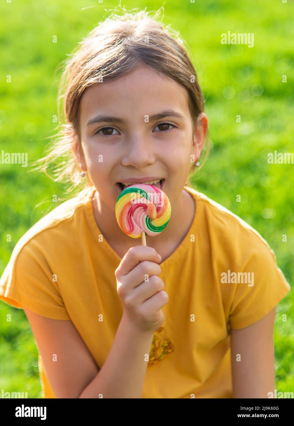 A cute teenage girl in underwear and candy lollipop, Stock Photo, Picture  And Rights Managed Image. Pic. BWI-BS107532