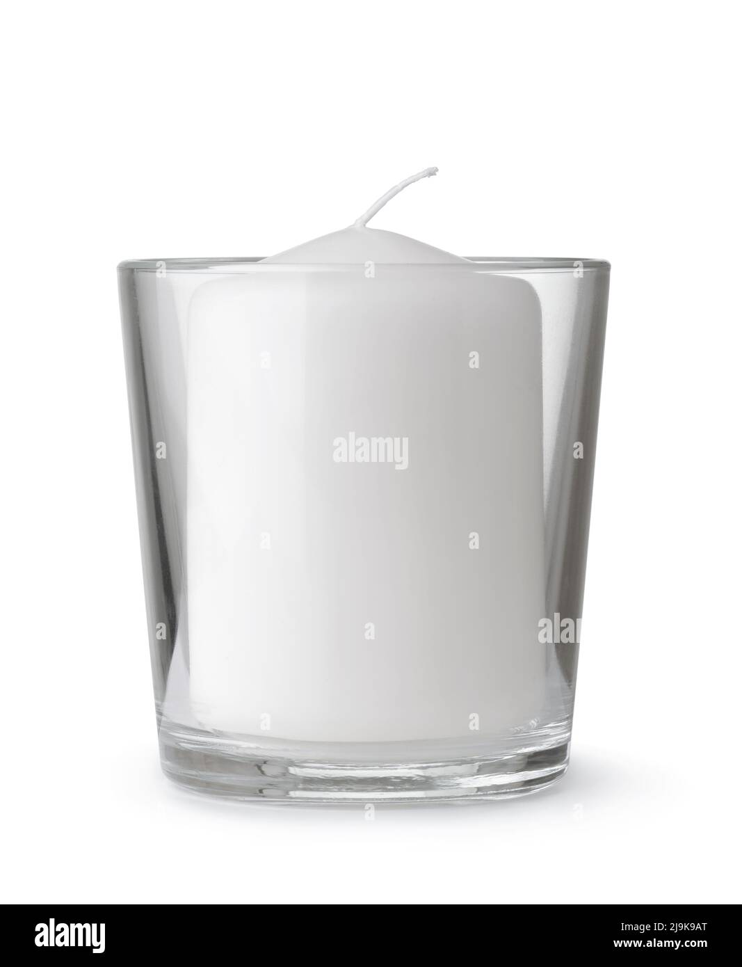 Front view of white wax candle in clear glass holder isolated on white Stock Photo