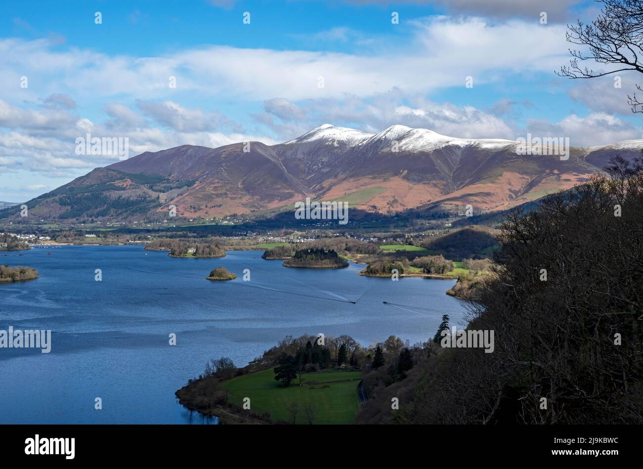 Looking from Surprise View across Derwentwater to Keswick and snow on Skiddaw in spring late winter Lake District National Park Cumbria England UK Stock Photo