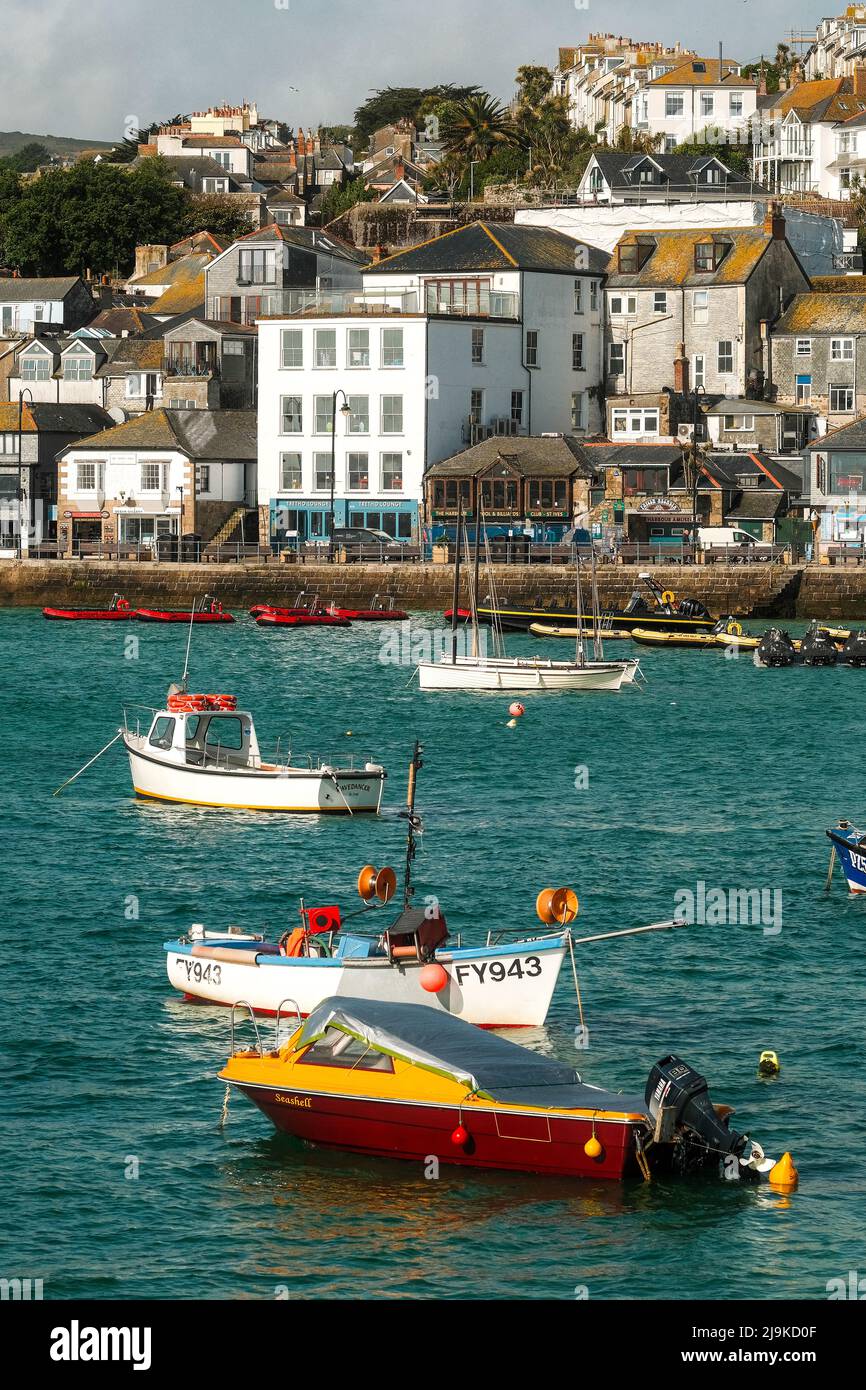 St Ives, Cornwall, UK. Fishing Boats in St Ives Harbour at High Tide. Stock Photo