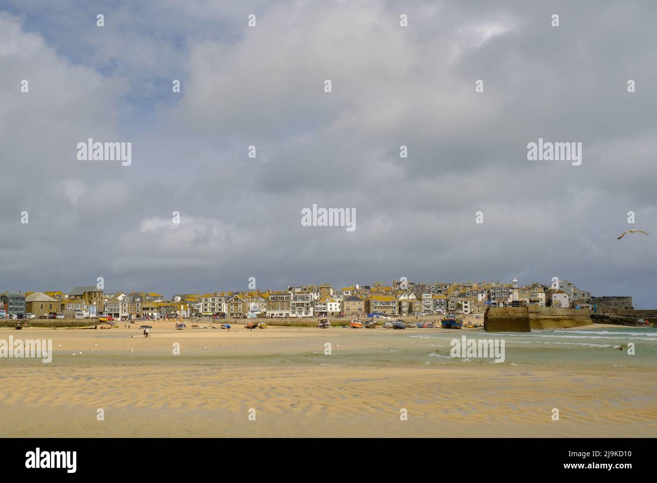 St Ives, Cornwall, UK. The Harbour beach as the tide starts to come in. Stock Photo