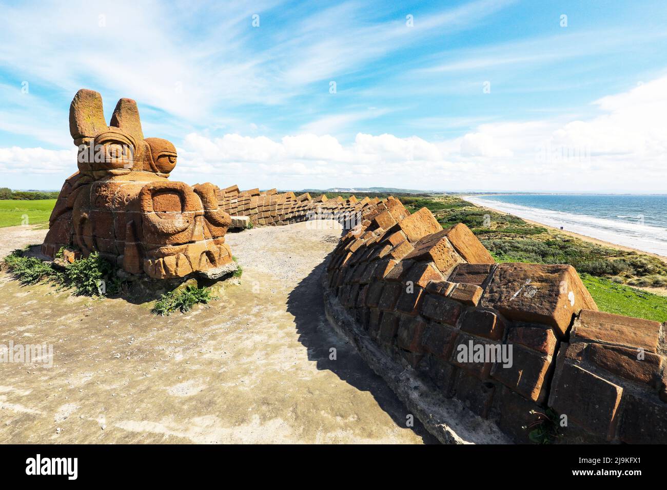 The Stone Dragon is known locally as the Great Protector of Irvine, Guardian of the Beach Park and Watcher on the Hill. Stock Photo