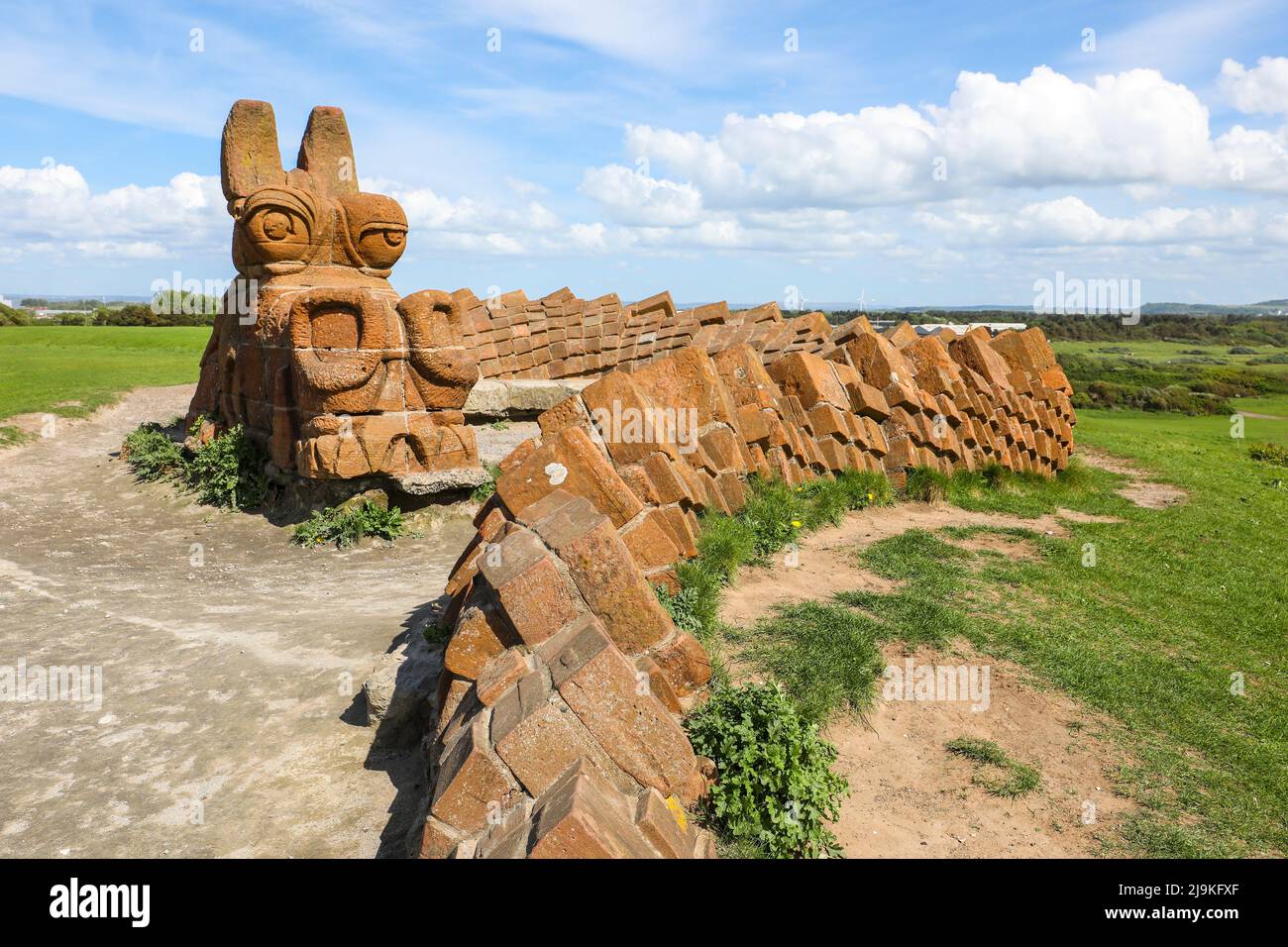 The Stone Dragon is known locally as the Great Protector of Irvine, Guardian of the Beach Park and Watcher on the Hill. Stock Photo