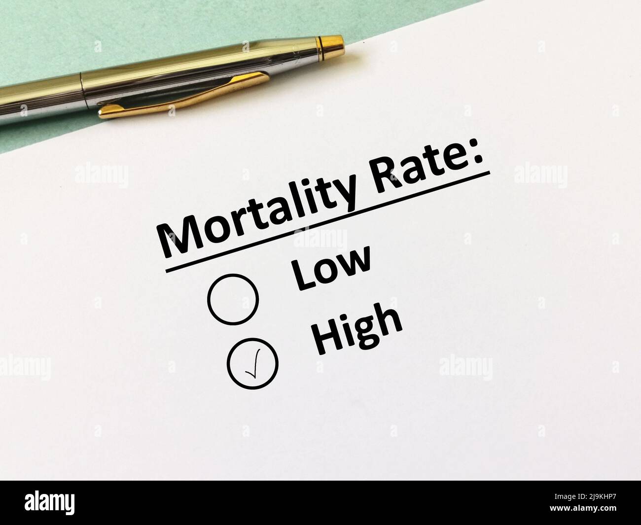 One person is answering question about medicine and treatment. The person thinks that the mortality rate is high. Stock Photo