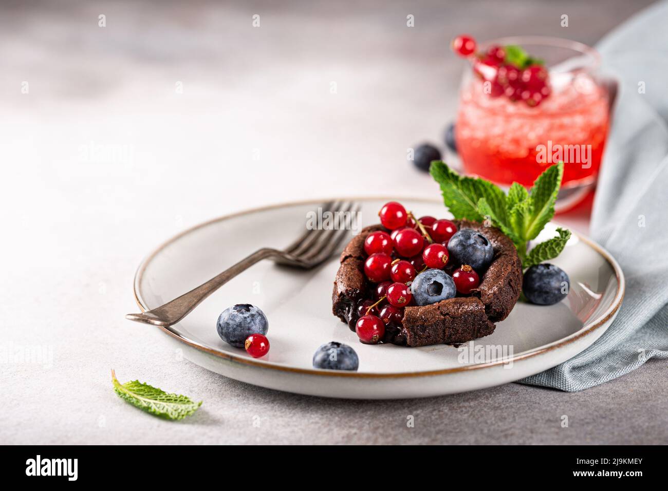 Hot chocolate Lava Cake with berries Stock Photo