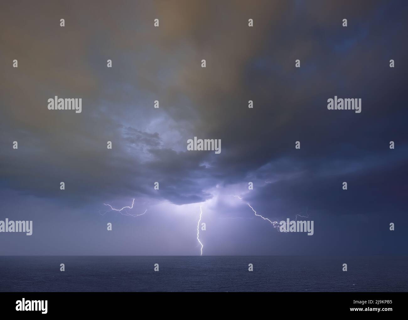 Lightning thunderstorm on stormy dark sky over the sea Stock Photo - Alamy